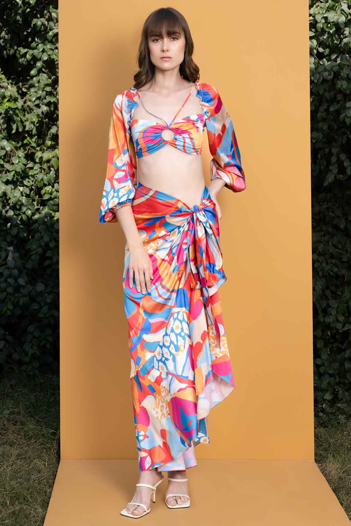 Buy Pop Abstract Printed Satin Top & Skirt Set by Mandira Wirk